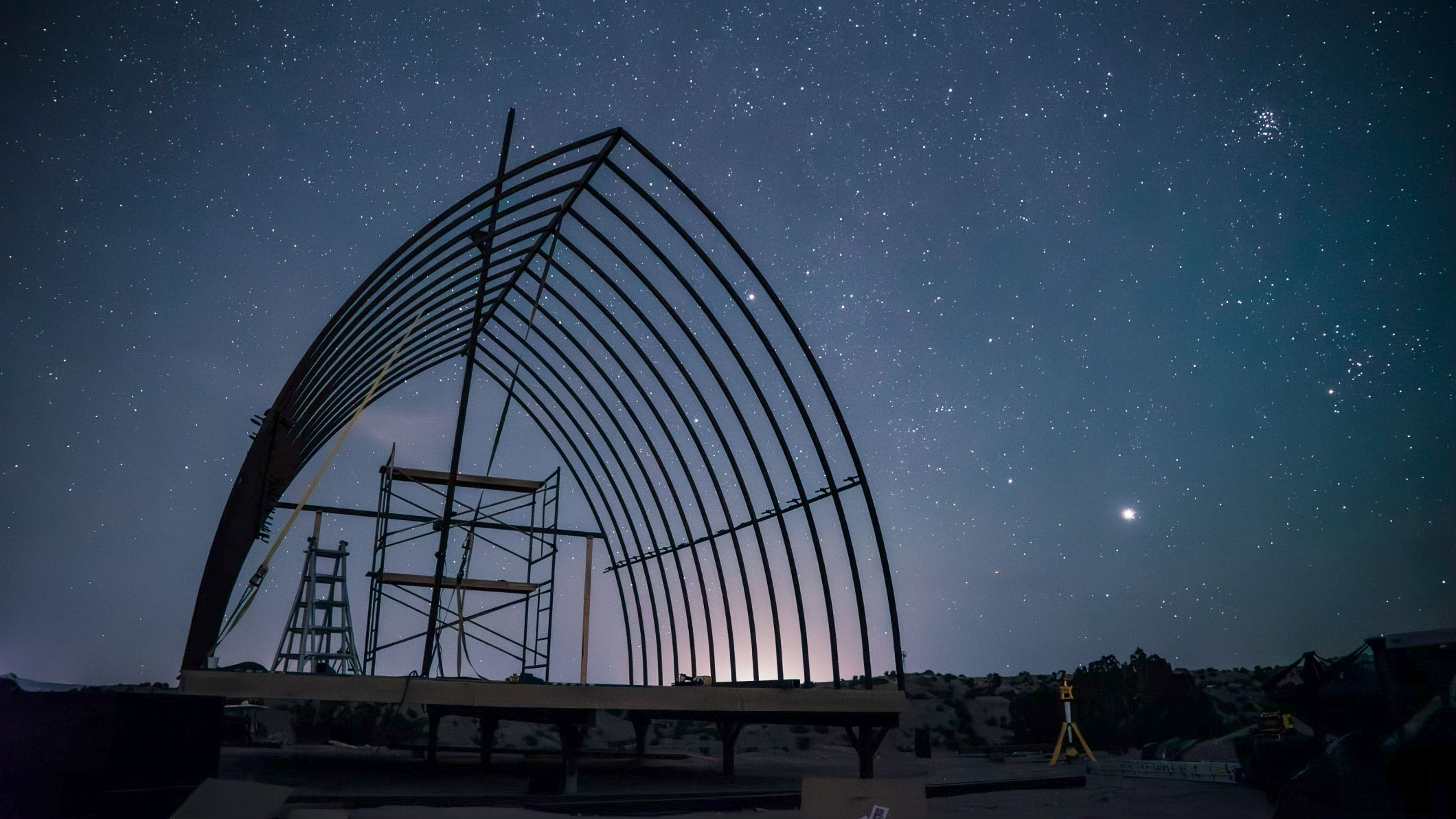 texas arched cabins frame at nighttime